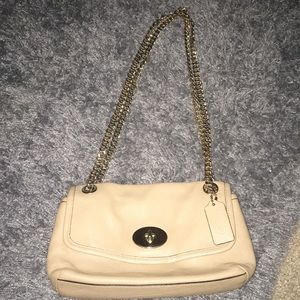 Coach nude pebble leather purse.